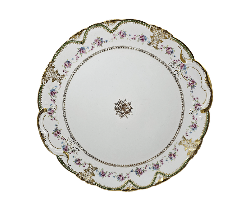 Decorative ceramic plate with floral patterns on a white background