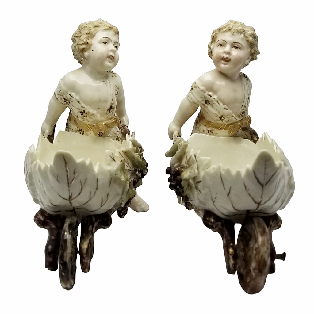 Volkstedt Garden Putti Cherubs Pushing Wheelbarrows with Moving Wheels