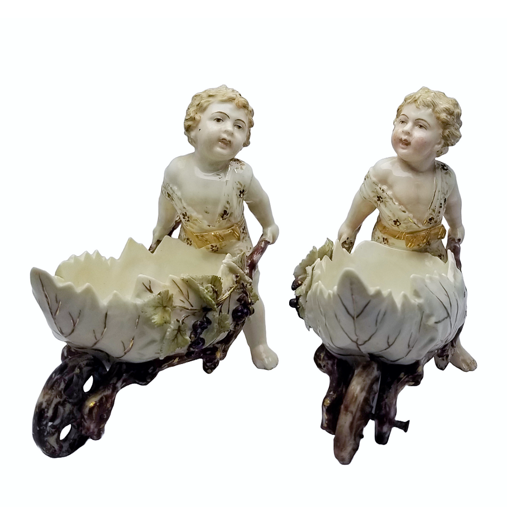 Volkstedt Garden Putti Cherubs Pushing Wheelbarrows with Moving Wheels