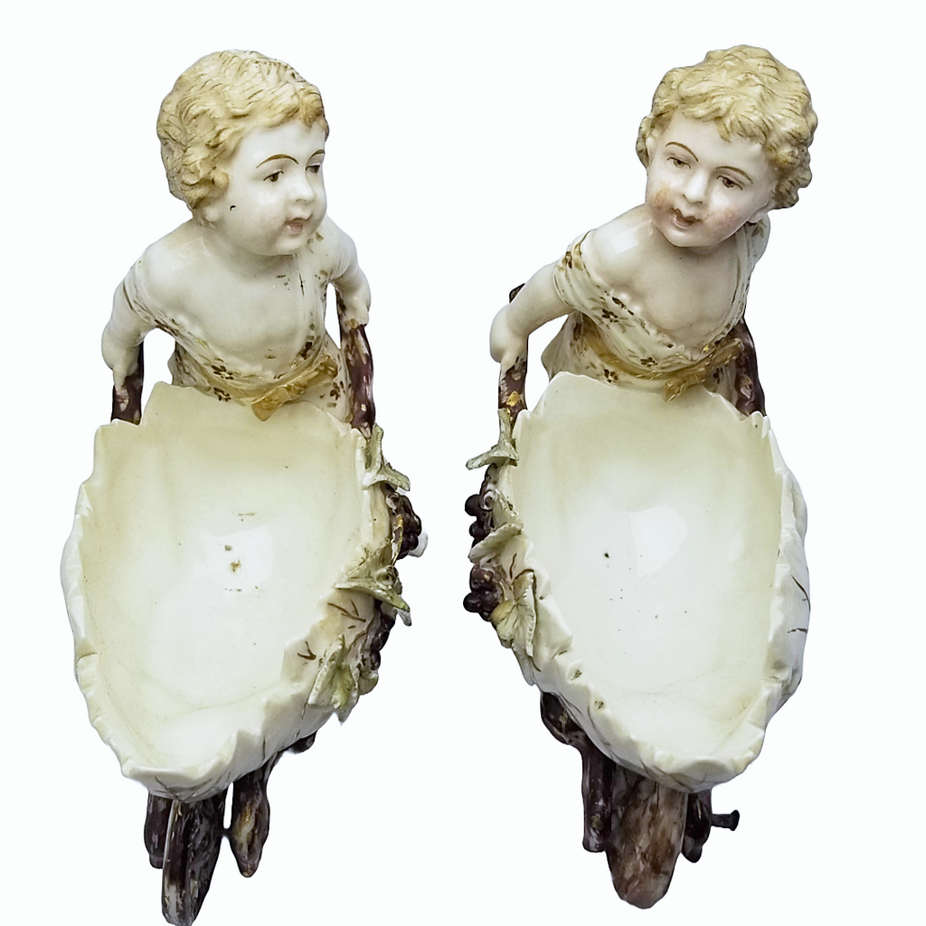 Volkstedt Garden Putti Cherubs Pushing Wheelbarrows with Moving Wheels