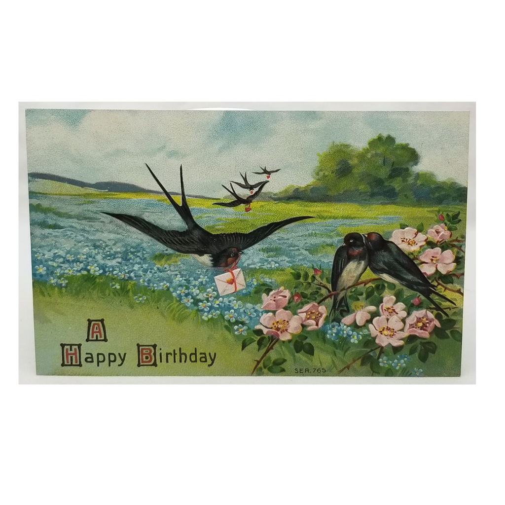 Greetings Postcard Happy Birthday Embossed Unused Card Swallows Carrying Envelopes with Hearts Flying Over Blue & Pink Flower Fields