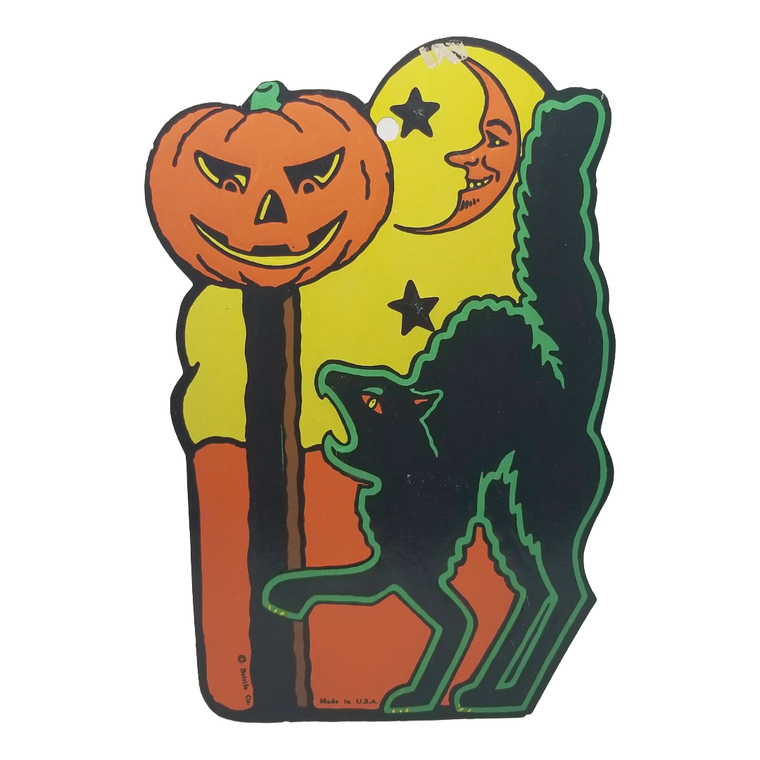 A vintage Halloween-themed metal sign or decorative cutout featuring a smiling jack-o'-lantern on a pole, a yellow crescent moon and stars, and a black wolf with green outline, shown on a plain white background.