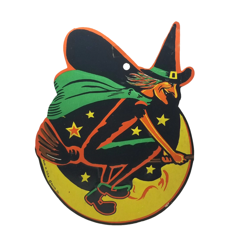 beistle halloween die cut of a witch on her broom flying above the smiling moon