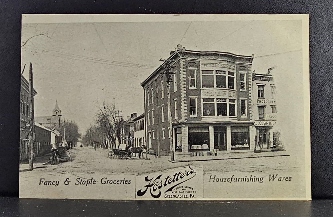Greencastle PA: Hostetter's Groceries, Vintage Storefront Postcard (1900s)