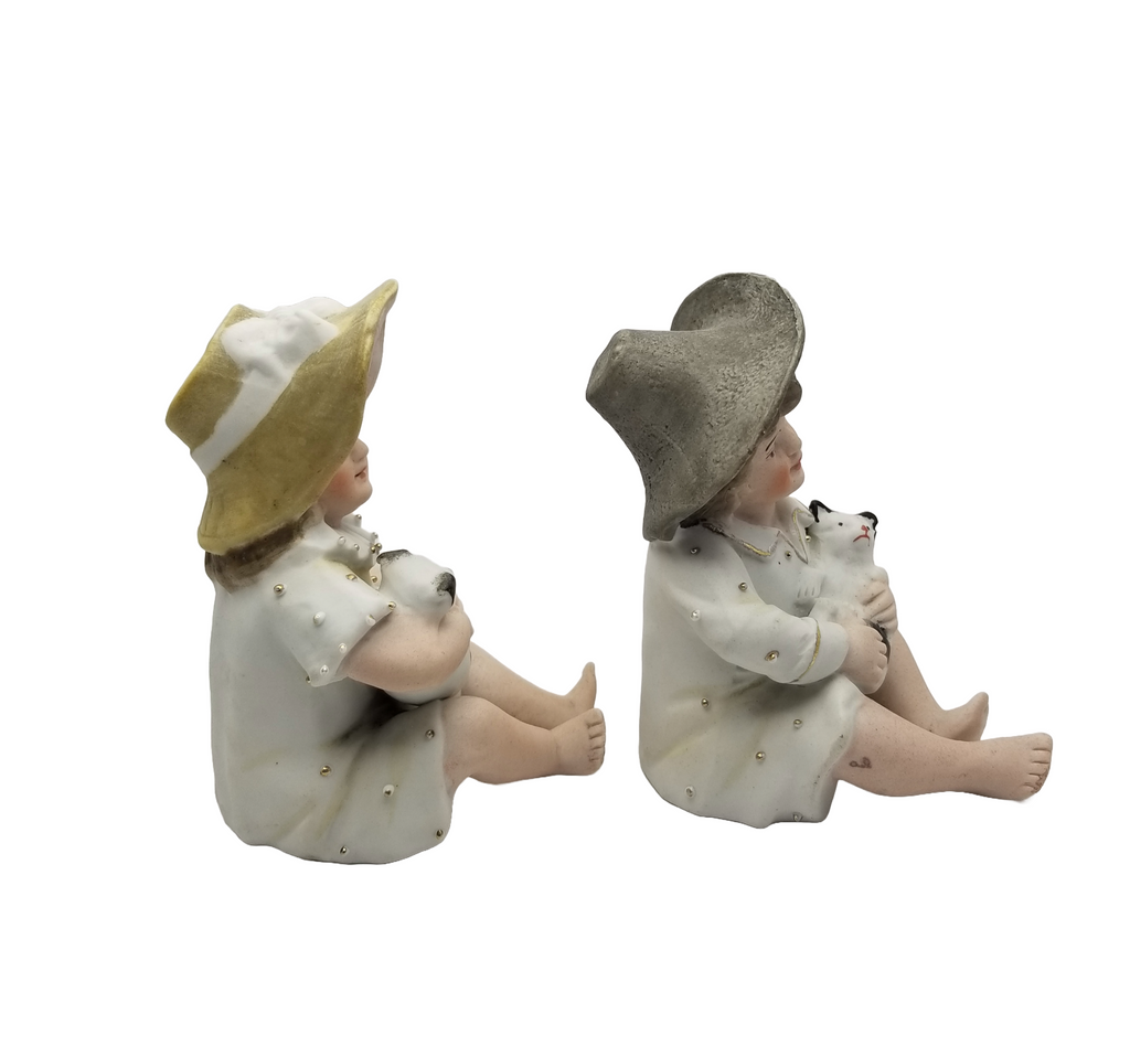 German Porcelain Bisque Piano Baby Pair Two Statues Figurines Boy Holding Kitty Cat Girl Holding Puppy Dog Heubach Quality