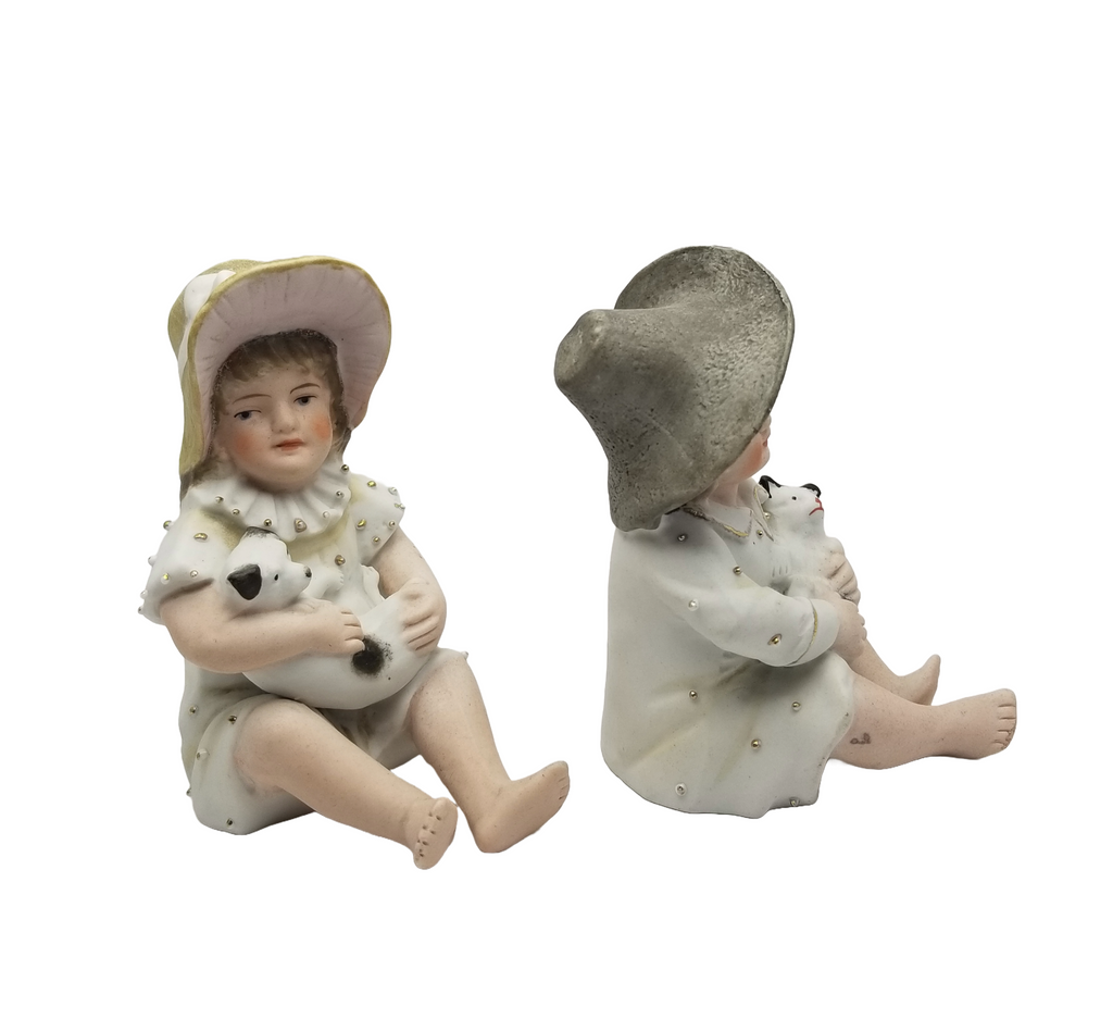 German Porcelain Bisque Piano Baby Pair Two Statues Figurines Boy Holding Kitty Cat Girl Holding Puppy Dog Heubach Quality