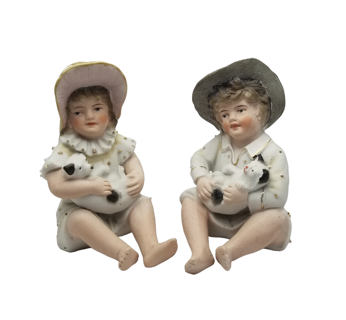 German Porcelain Bisque Piano Baby Pair Two Statues Figurines Boy Holding Kitty Cat Girl Holding Puppy Dog Heubach Quality