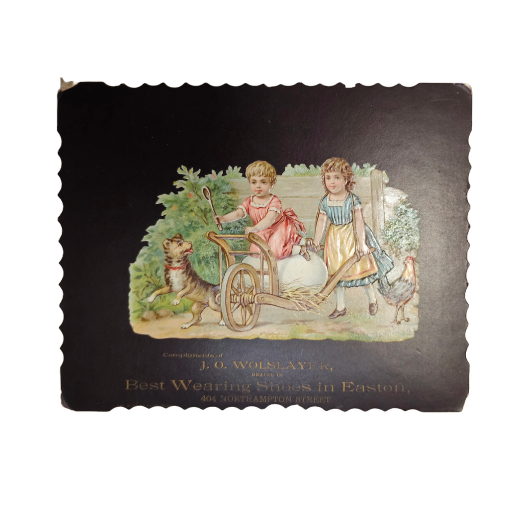 Easter Themed Victorian Advertising Trade Card Die Cut Children Riding Cart with Egg J. Wolslayer Best Shoes Easton PA