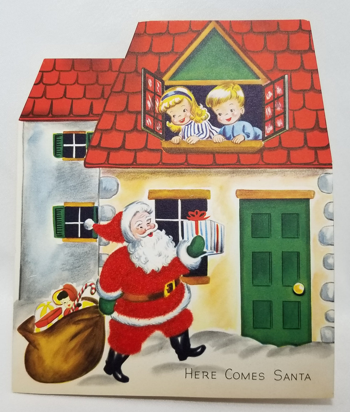 Here Comes Santa Die Cut Christmas Card St Nick with Children in Snow Covered House 1950s