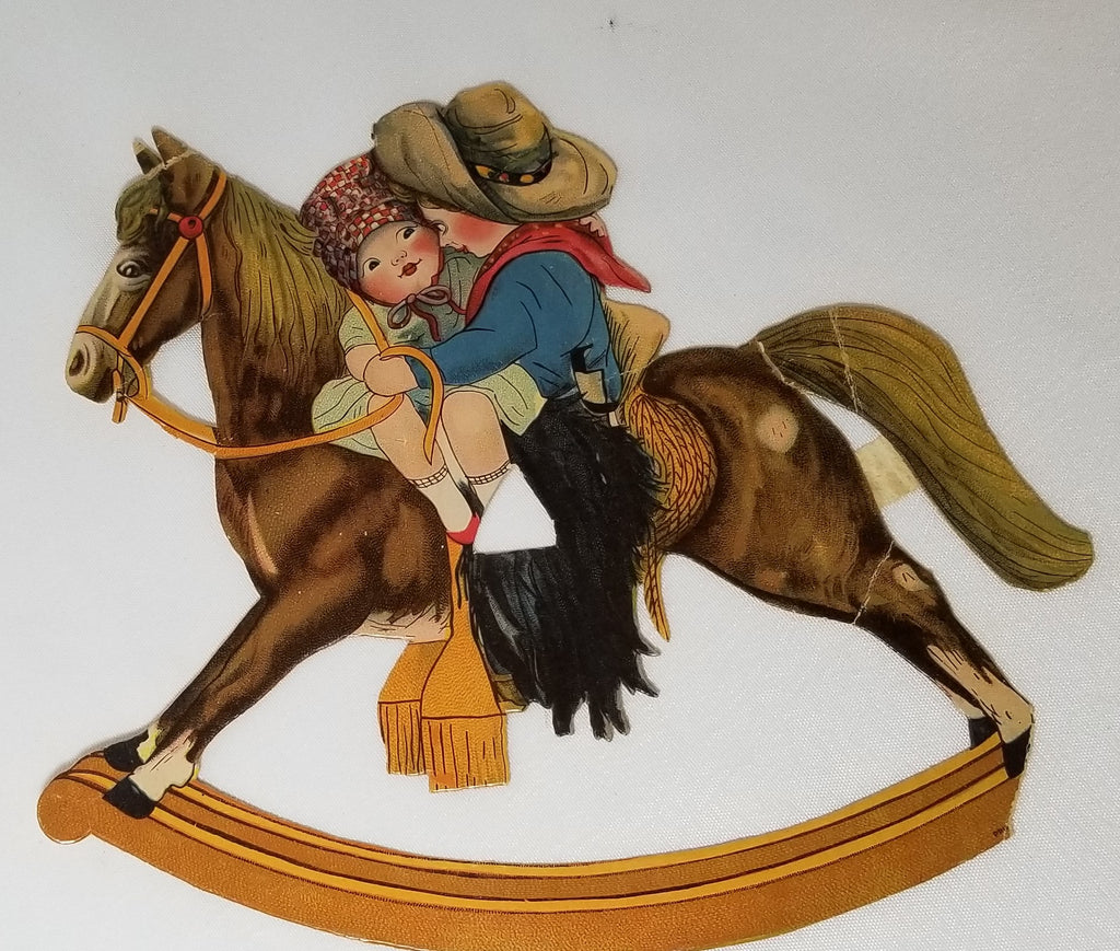 Die Cut Cowboy Holding Little Girl on Rocking Horse