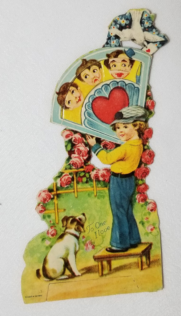 Mechanical Valentine Card Boy Holding Large Fan with Changing Faces Showing His Dog Made in Germany
