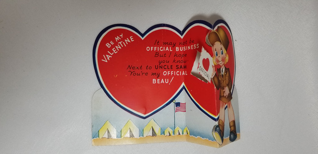 Antique Vintage Die Cut Valentine Card Little Girl in Army Fatigues Delivering Letter at Military Base