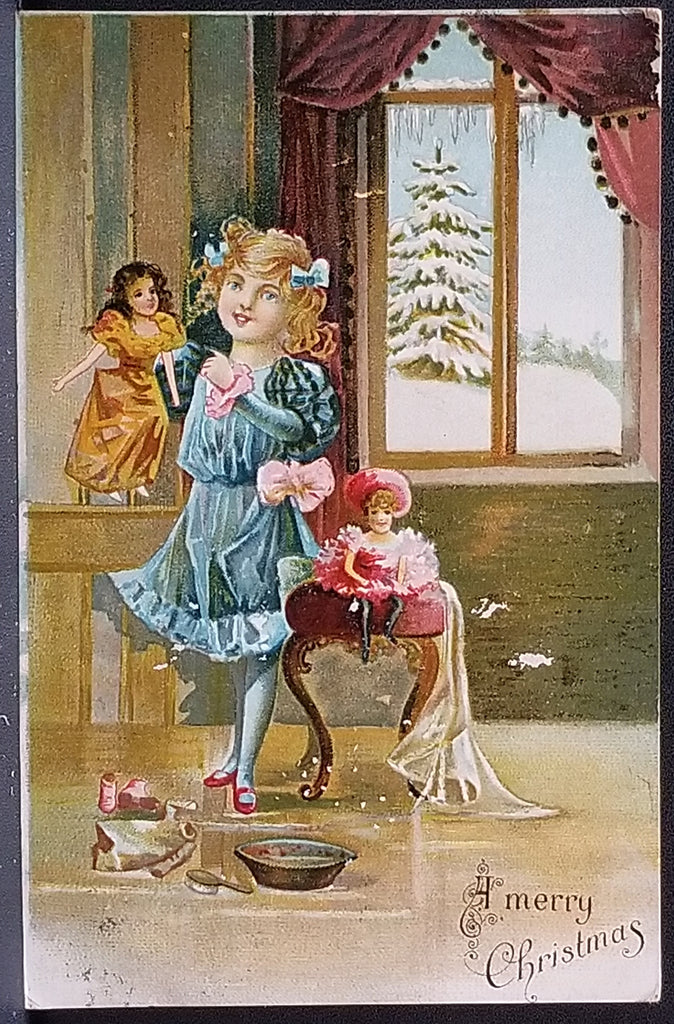 Christmas Postcard Young Girl Playing with Dolls Snow Falling Out Window Series 543