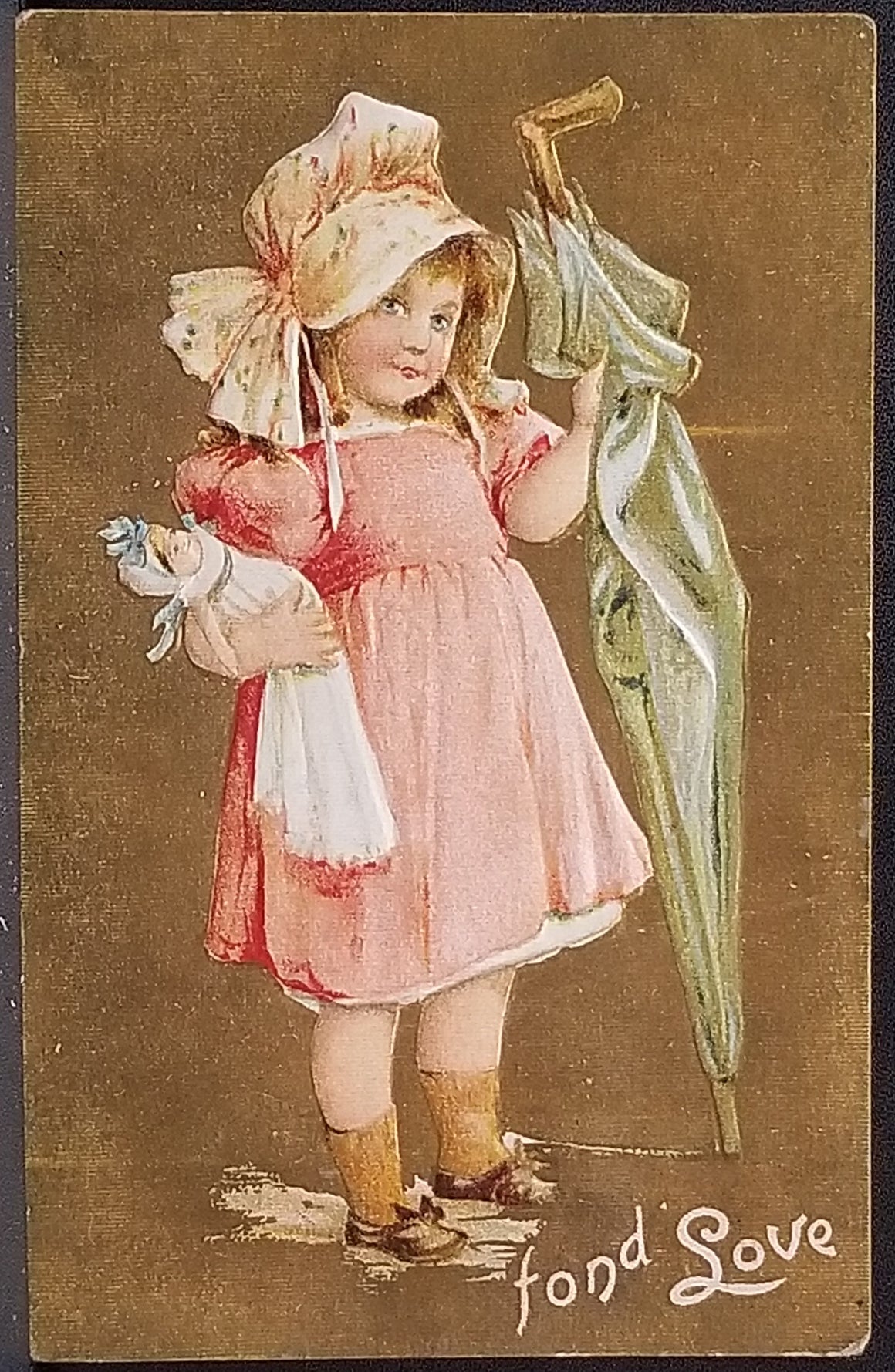 Valentine Postcard Child in Bonnet and Pink Dress Holding Umbrella & Doll Gold Background Fond Love