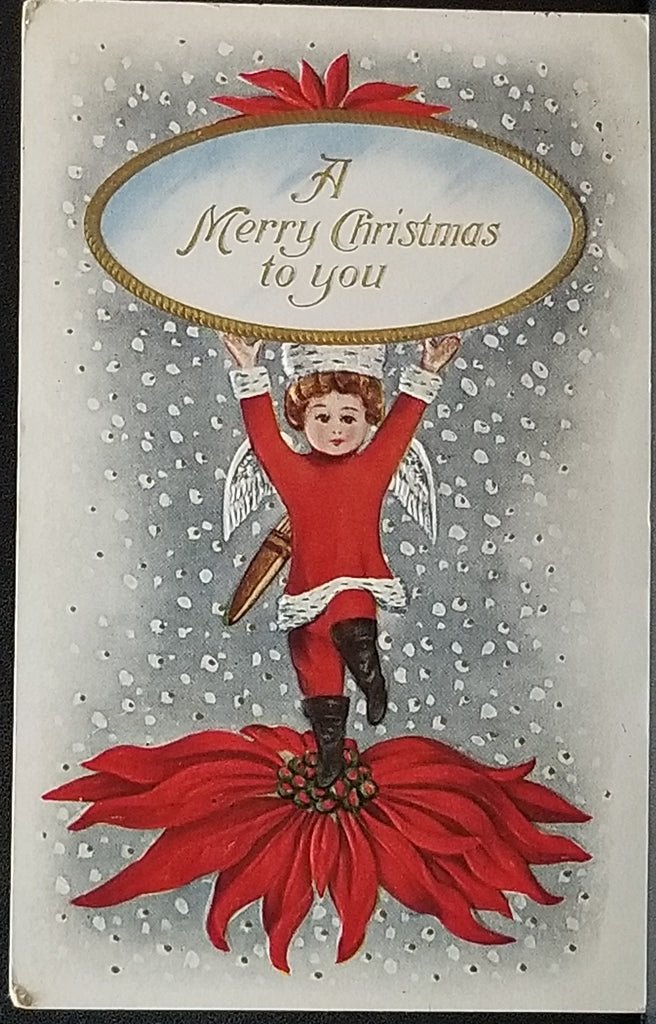Christmas Postcard Little Santa Claus Dressed Angel Holding Up Sign on Large Poinsettia
