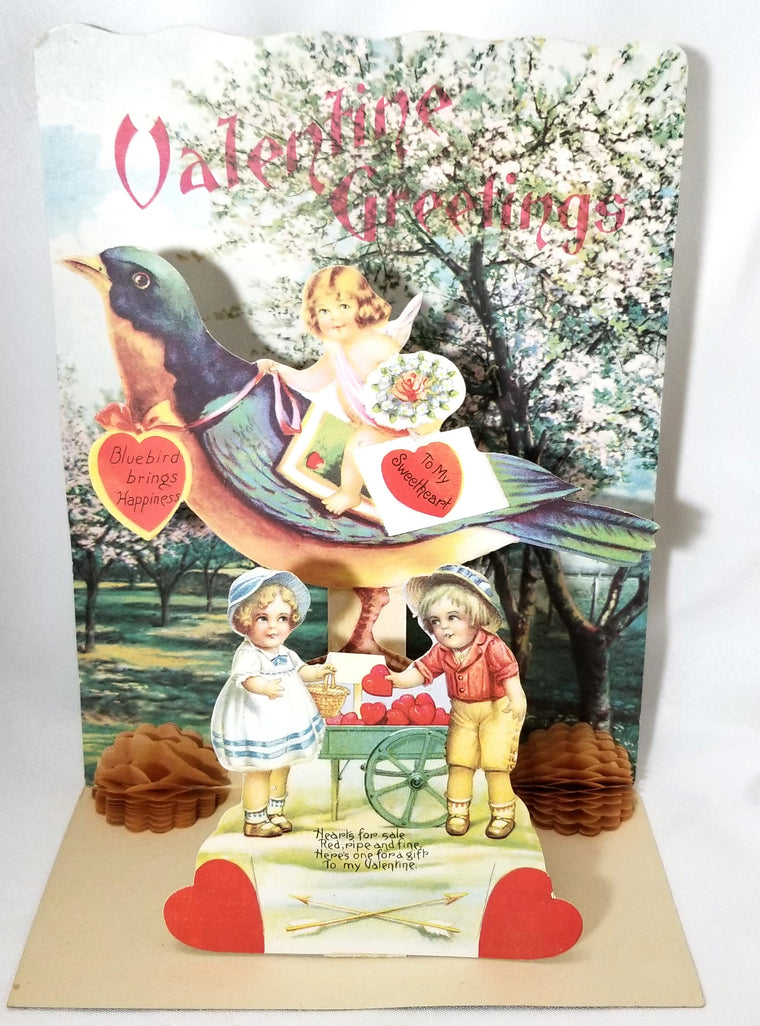 Large Vintage Antique Valentine Card Embossed with Fold Down 3D Cupid Riding Giant Blue Bird Children Trading Hearts From Wagon Germany