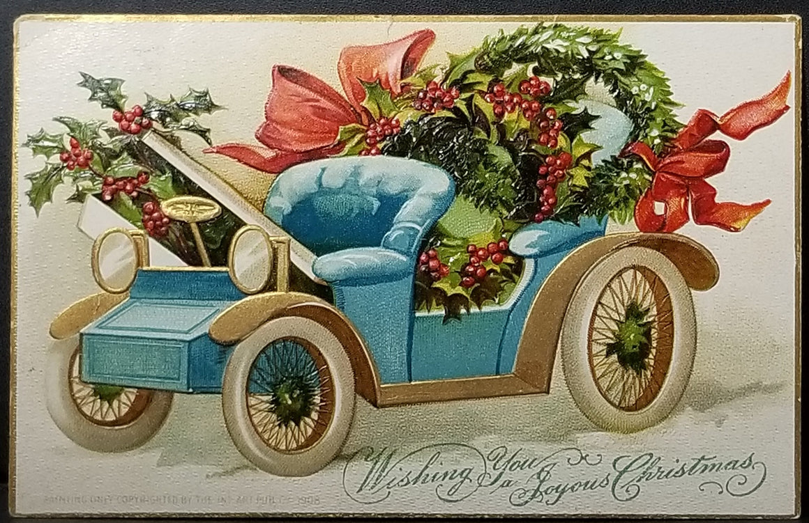 Christmas Postcard Blue Car With Holly and Wreaths Artist Ellen Clapsaddle IAP Publishing