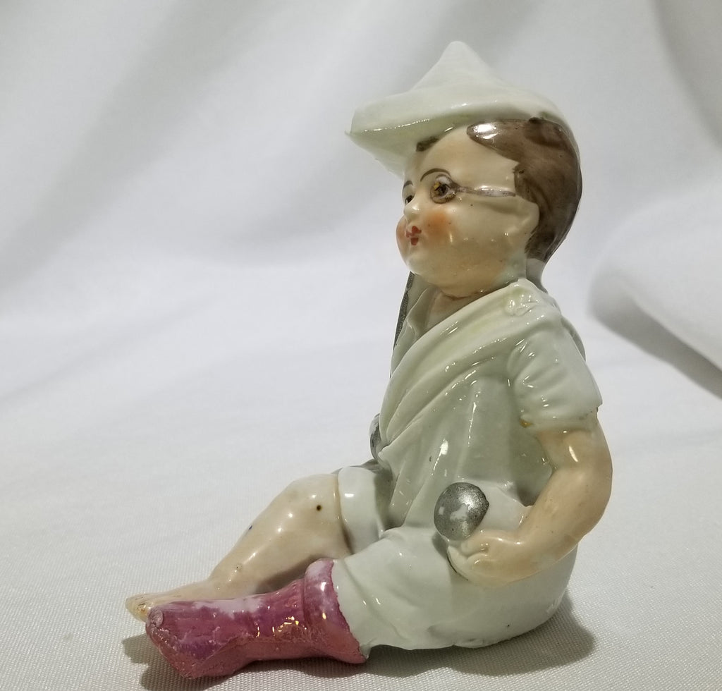 Vintage Piano Baby Hand Painted Porcelain Figurine Boy in Sock Holding Toy Ball & Stick