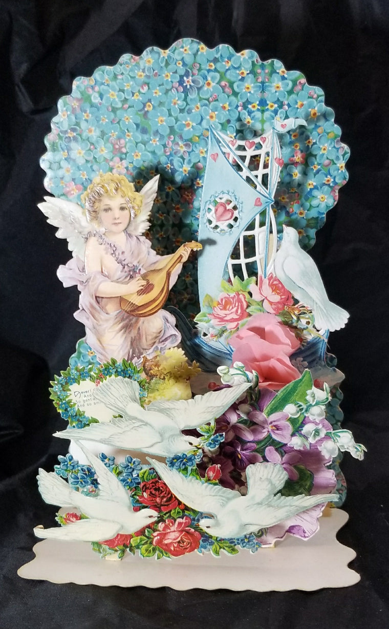 Vintage Antique Large 3D Fold Down Valentine with Cupid Playing Mandolin Boat Covered in Flowers with Honeycomb