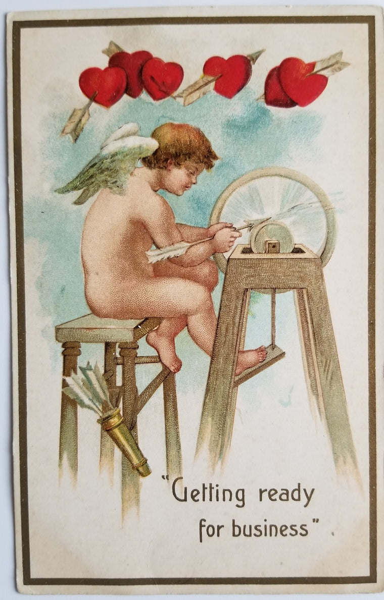 Valentine Postcard Cupid Sharpening Arrow Embossed Hearts Made in Germany
