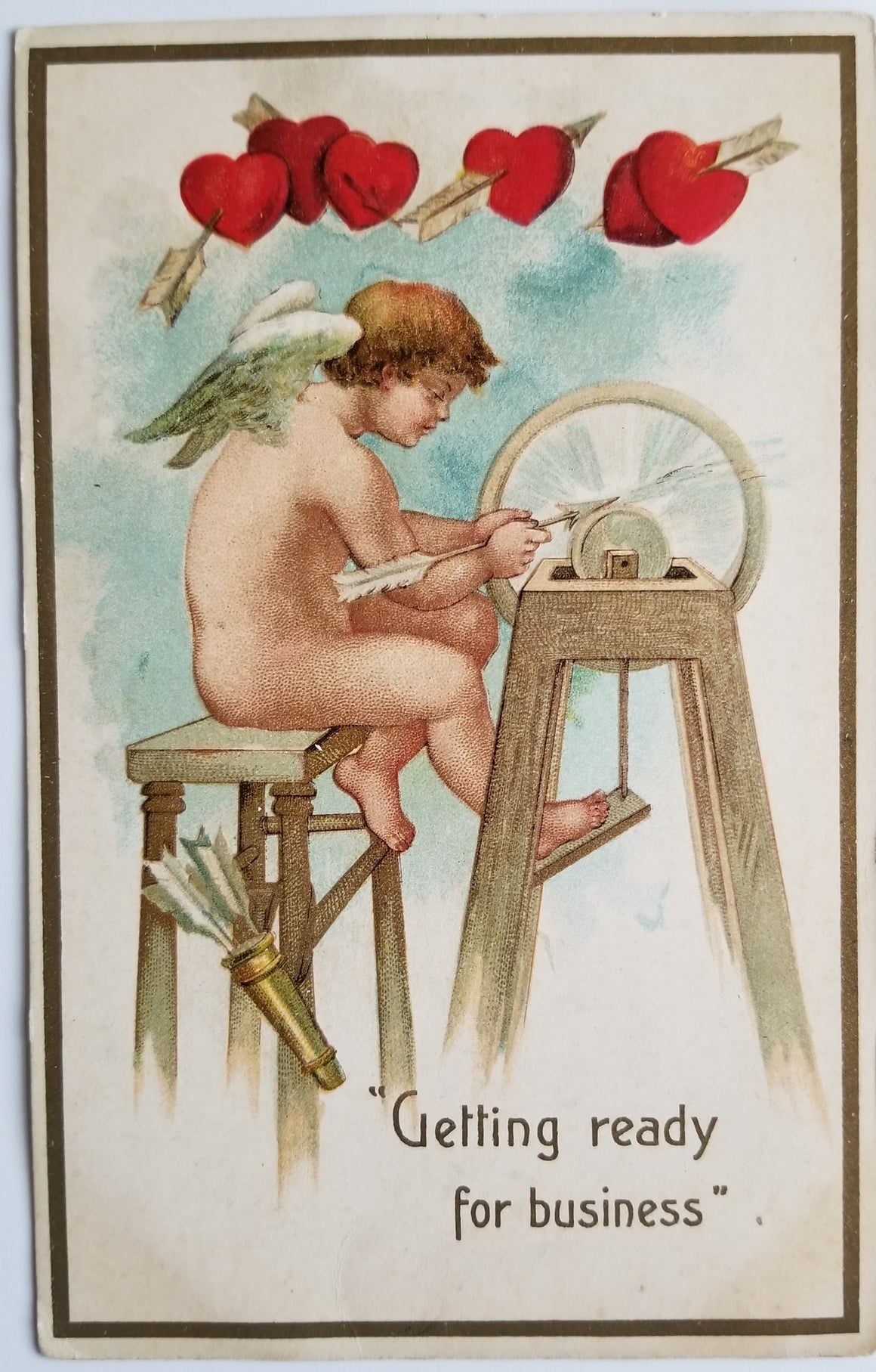 Valentine Postcard Cupid Sharpening Arrow Embossed Hearts Made in Germany