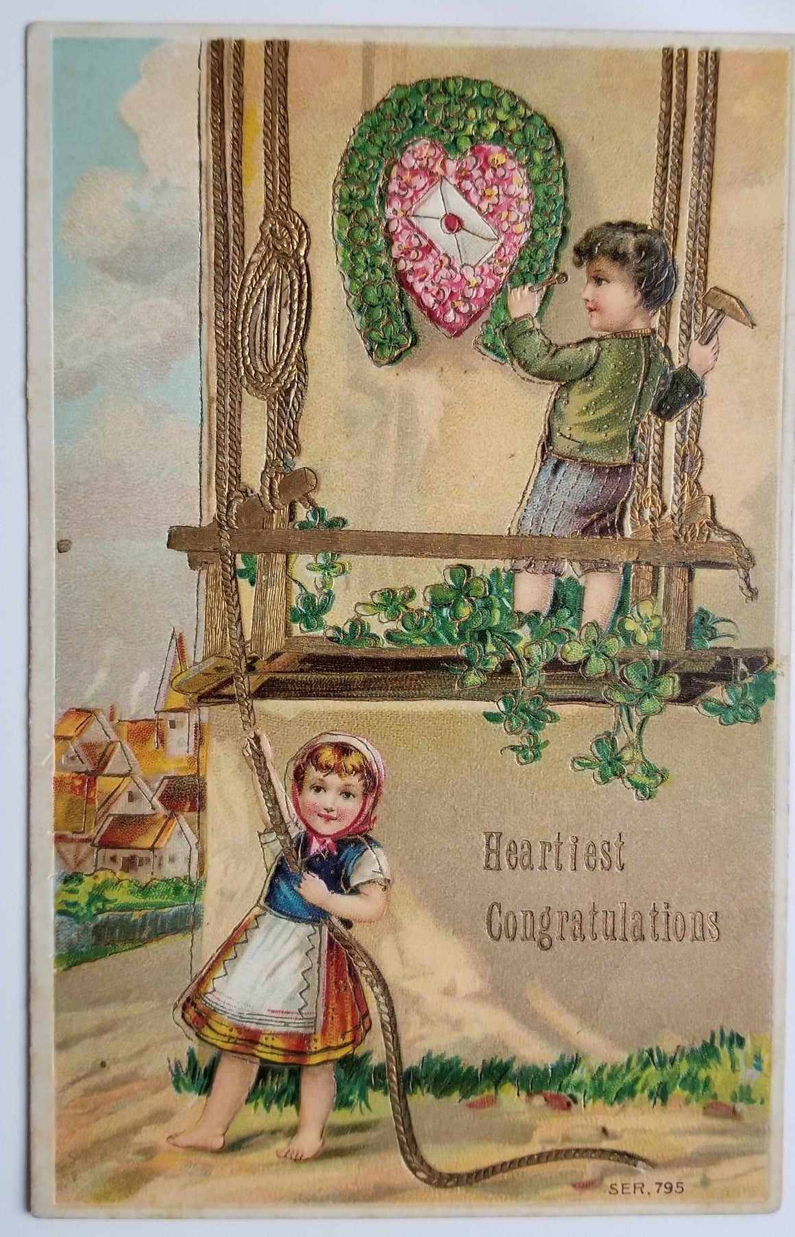 Congratulations Postcard Series 795 Children Hanging Lucky Shoe of Flowers Gold Embossed