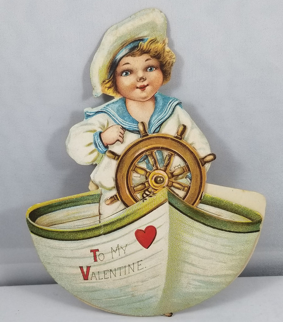 RARE Vintage Antique Die Cut Mechanical Valentine Card Little boy in Sailor Suit Turning the Helm of Boat