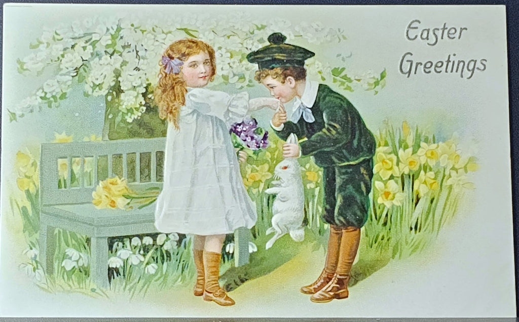 Easter Postcard Raphael Tuck Publishing Series 700 Young Boy Gifting Girl with a White Rabbit Daffodils Everywhere Silver Embossed