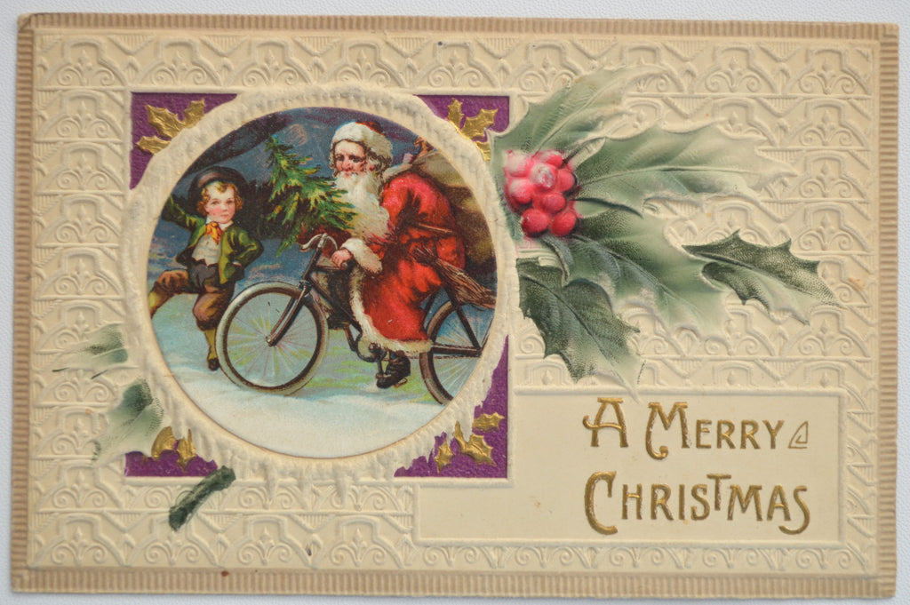 Christmas Postcard Embossed Santa on Bicycle with Child