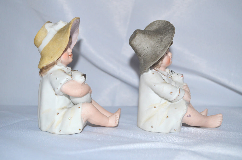 German Porcelain Bisque Piano Baby Pair Two Statues Figurines Boy Holding Kitty Cat Girl Holding Puppy Dog Heubach Quality