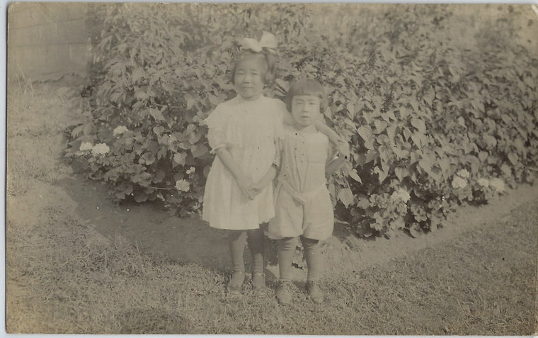 RPPC Real Photo Postcard Two Adorable Asian American Children Posing and Hugging Each Other 1910