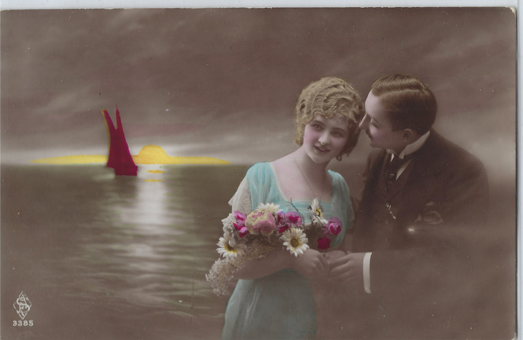 RPPC Real Photo Hand Tinted Couple with Ocean In Background Sun Setting on Water