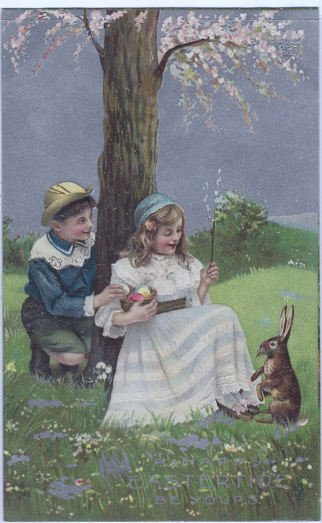 Easter Postcard Children Seated Under Tree Holding Eggs Talking to Bunny Rabbit Silver Background Germany