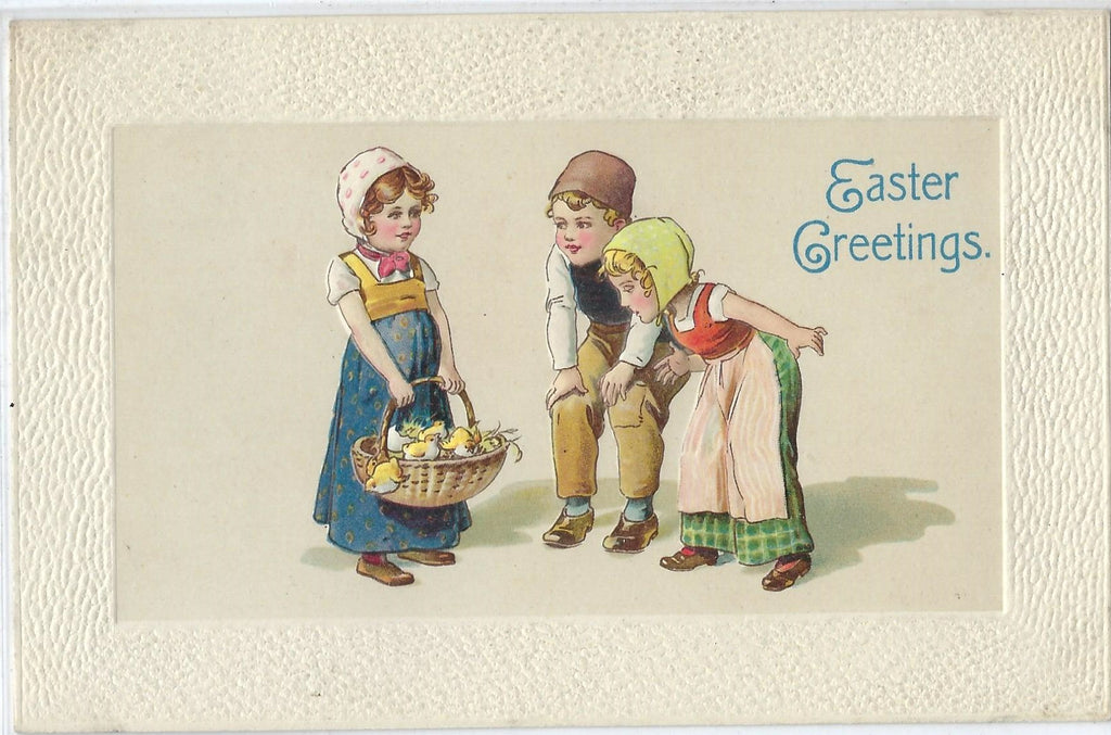Easter Postcard Children in Dutch Dress With Basket of Baby Chicks Embossed Card