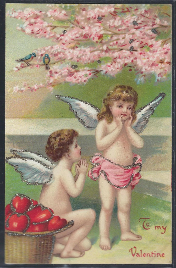 Valentine Postcard Cupid Boy Courting Little Cupid Girl with Basket of Hearts Embossed Applied Glitter Series 146