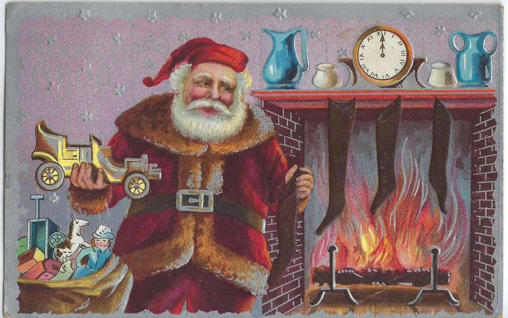 Christmas Postcard Santa Claus at Fireplace Stuffing Stockings Silver Embossed Card